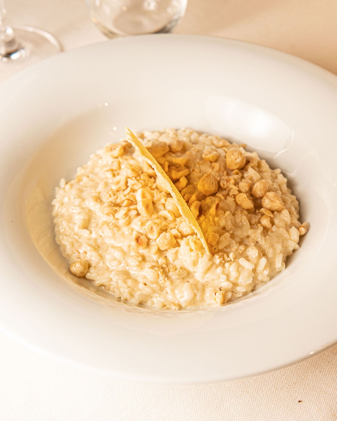 Risotto al Castelmagno con nocciole e cialda di formaggio